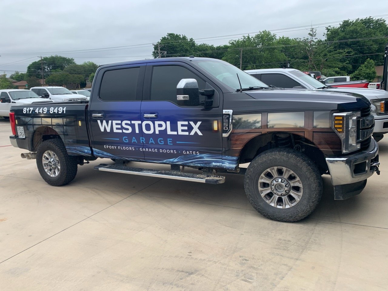 Technician performing gate service and install adjustments at a Fort Worth - TX driveway entrance